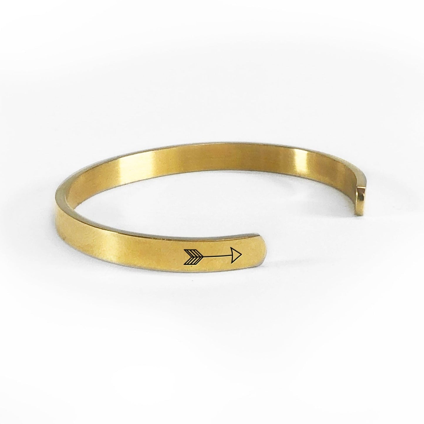 Live what you love bracelet in gold rotated to show arrows and cuff opening