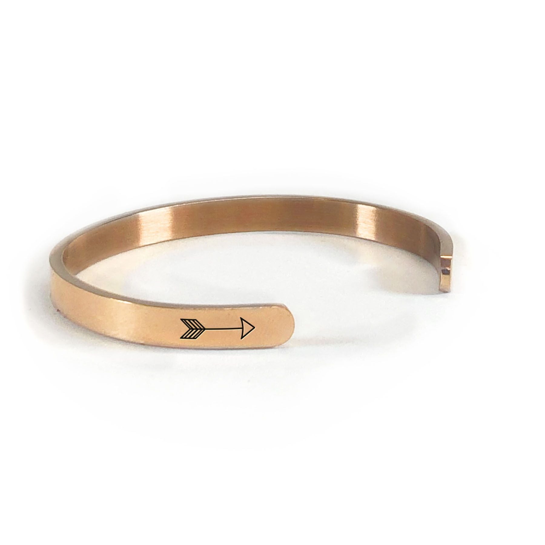 Ohana bracelet in rose gold rotated to show arrows and cuff opening